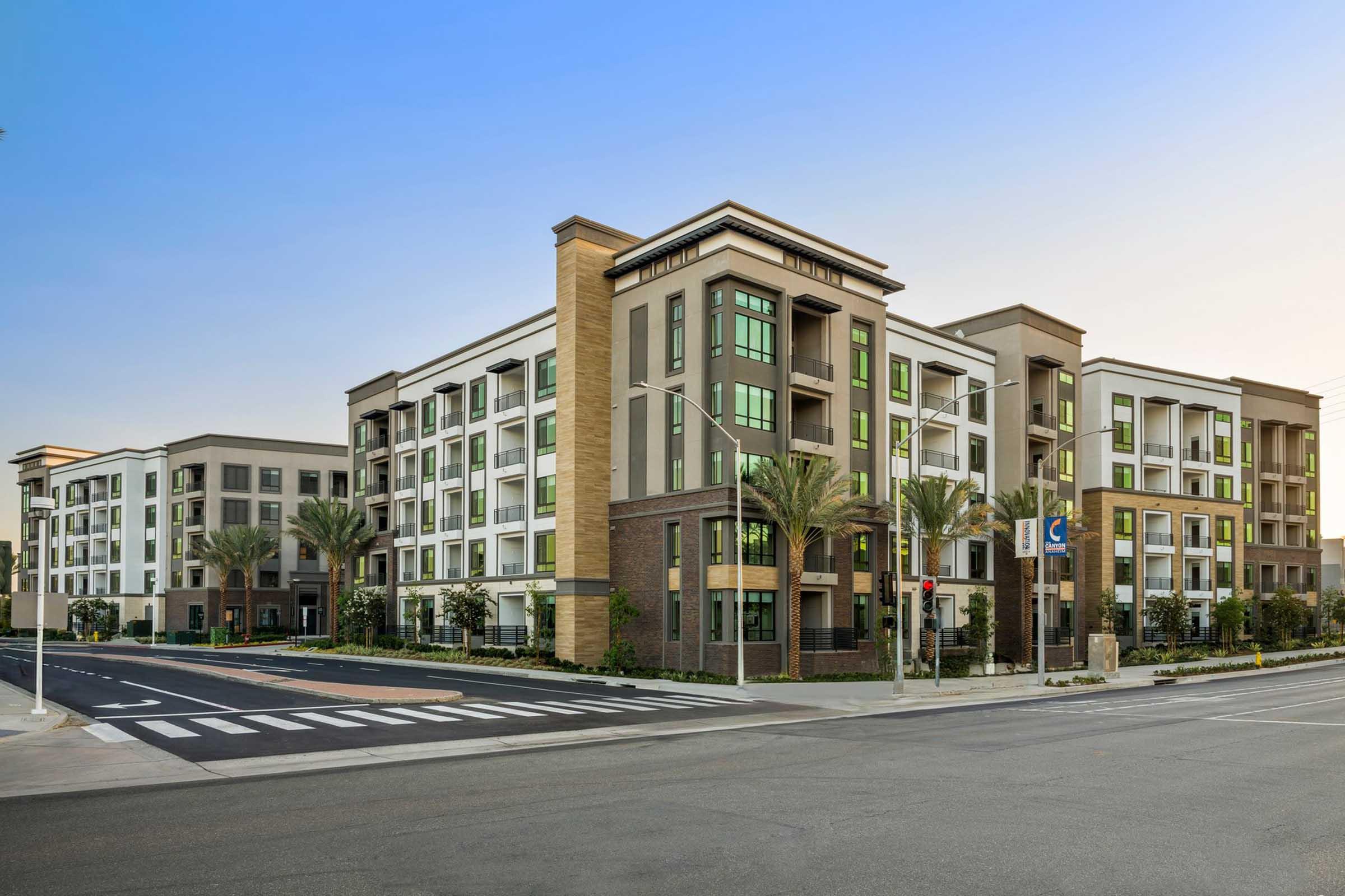 Link OC apartment building with five-story facades and private balconies